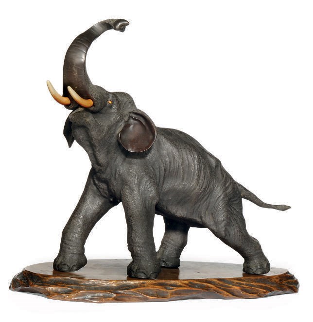A LARGE JAPANESE BRONZE ELEPHANT, SIGNED