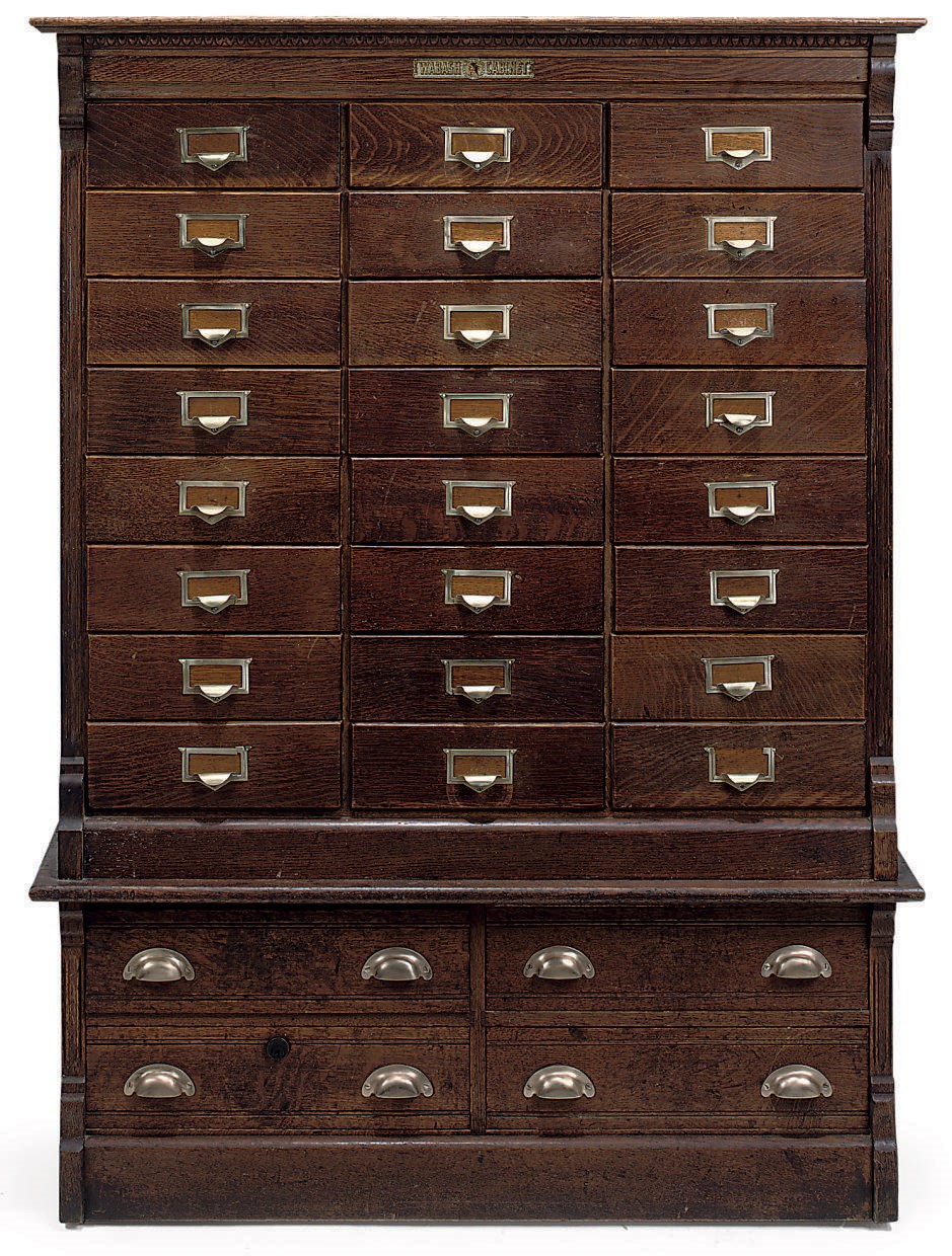 AN AMERICAN OAK FILING CABINET