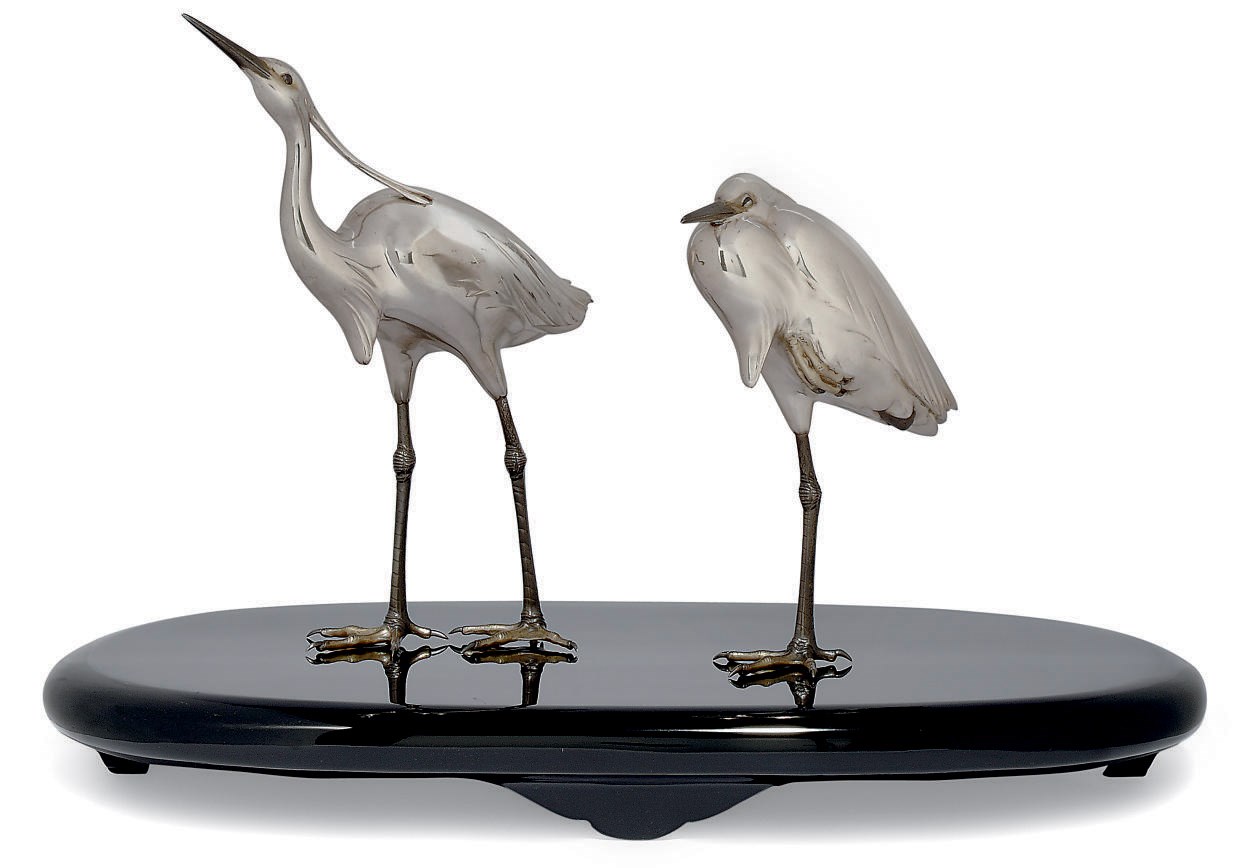 A PAIR OF JAPANESE SILVERED BRONZE EGRETS, SIGNED TOSHIYUKI