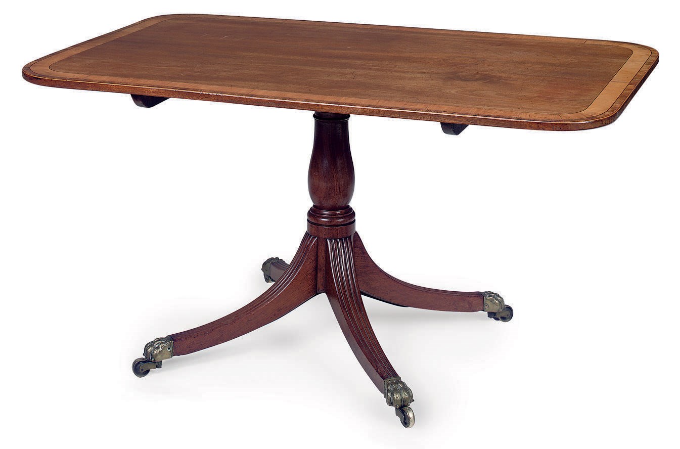 A REGENCY MAHOGANY AND ROSEWOOD AND FRUITWOOD CROSSBANDED BREAKFAST TABLE