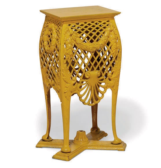 A VICTORIAN YELLOW-PAINTED CAST-IRON STAND WITH ASSOCIATED TOP