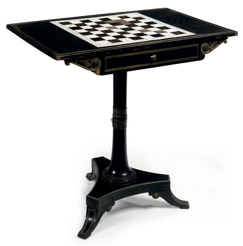 A REGENCY GILT-METAL MOUNTED EBONISED TABLE INSET WITH A VIZAGAPATAM IVORY AND TORTOISESHELL MOUNTED GAMES BOARD