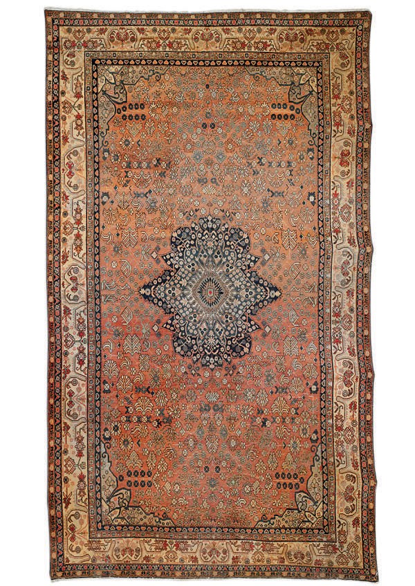 An antique Khotan carpet and an Afshar rug