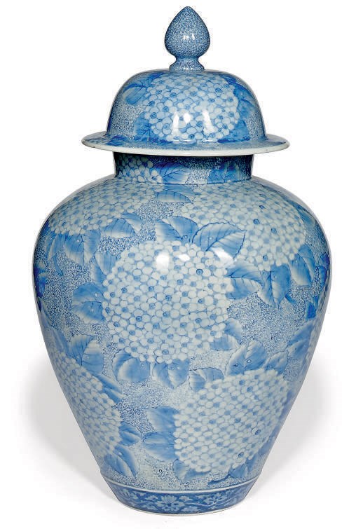 A LARGE JAPANESE JAR AND COVER