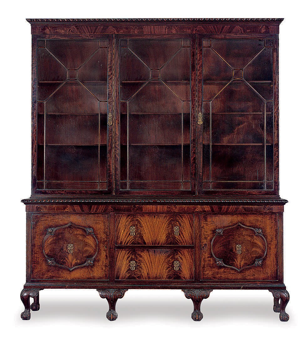 A CARVED MAHOGANY BOOKCASE