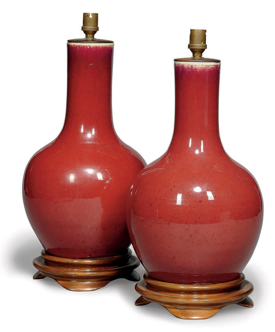 A MATCHED PAIR OF CHINESE SANG DE BOEUF LAMPED VASES