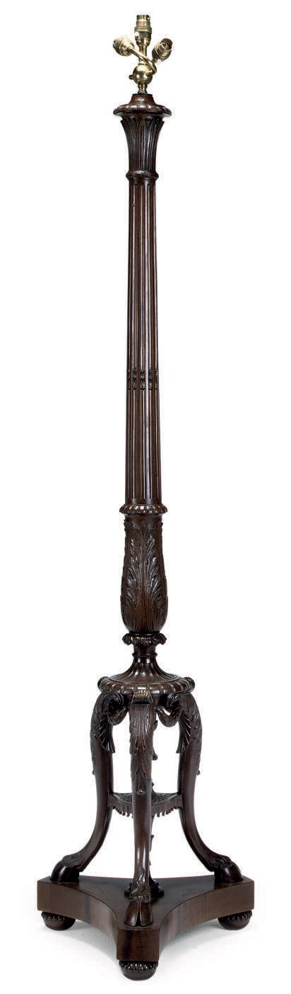 A LATE VICTORIAN CARVED MAHOGANY LAMP STANDARD