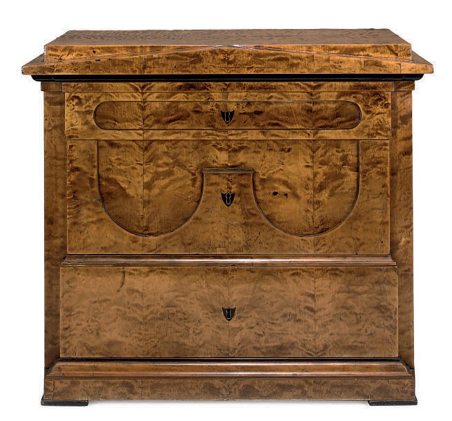 A NORTH EUROPEAN SATIN BIRCH AND EBONISED COMMODE