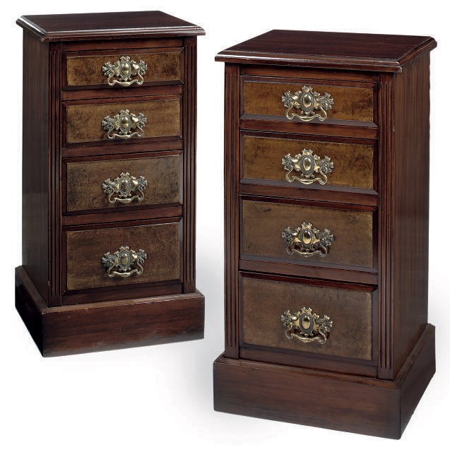 A PAIR OF STAINED WALNUT AND AMBOYNA BEDSIDE CHESTS