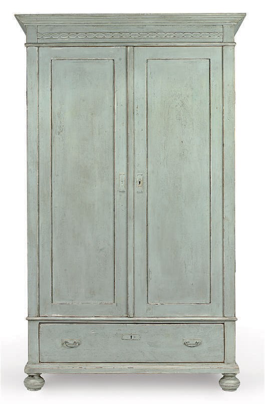 A DANISH PINE ARMOIRE