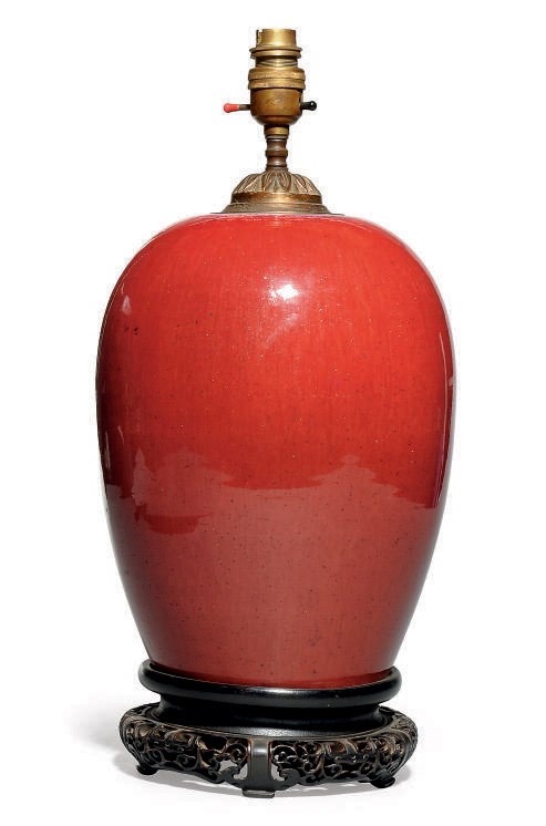 A CHINESE SANG DE BOEUF LAMPED JAR