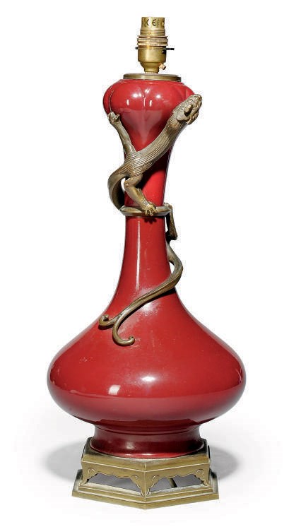 A CHINESE SANG DE BOEUF LAMPED BOTTLE VASE