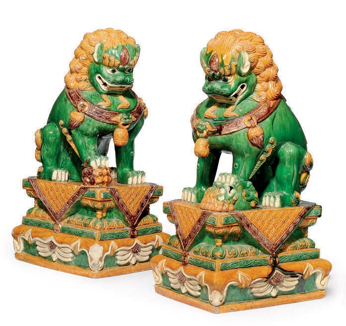 A PAIR OF LARGE CHINESE EGG AND SPINACH BUDDHISTIC LIONS