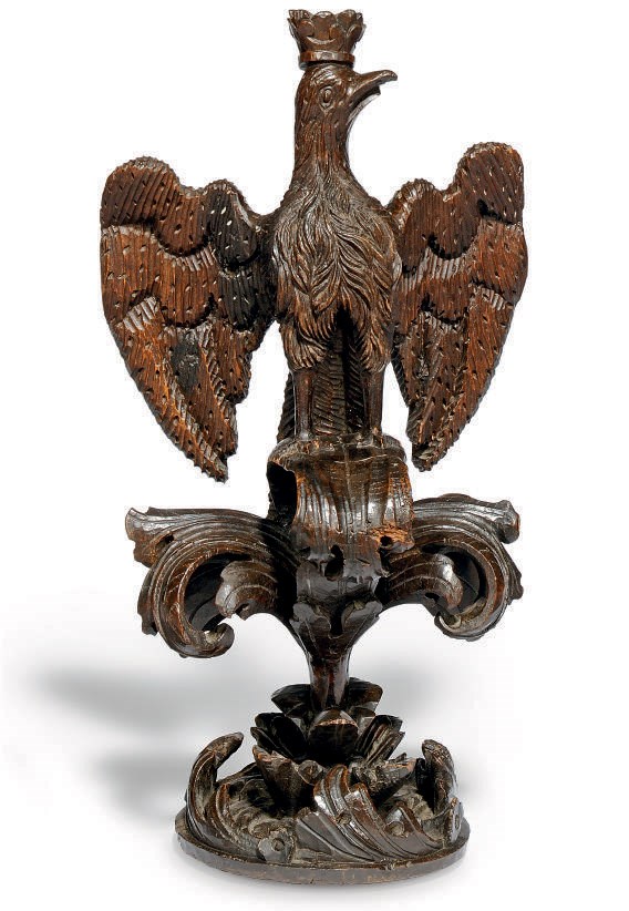 A GERMAN STAINED LIMEWOOD HERALDIC EAGLE FINIAL