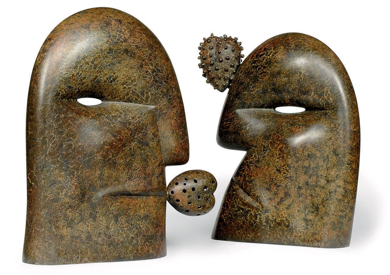 A PAIR OF BRONZE BUSTS OF THE KING AND QUEEN OF HEARTS