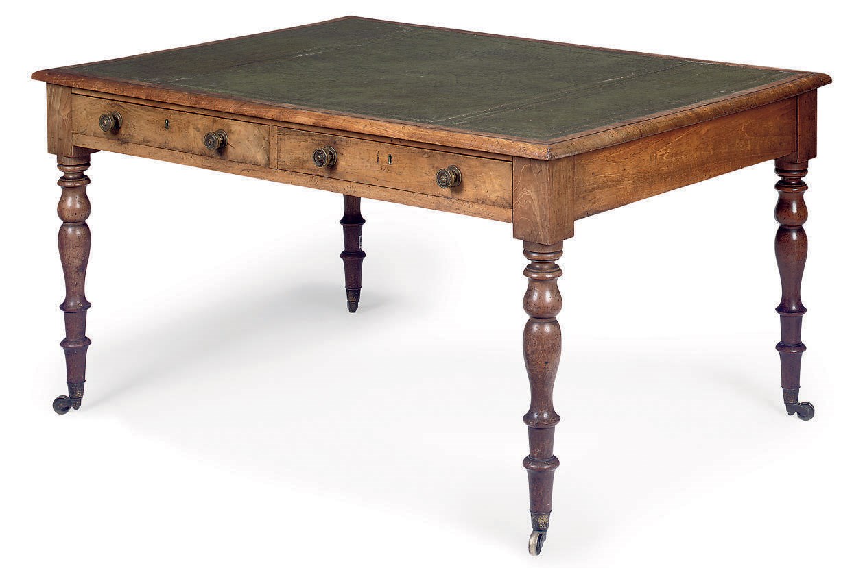 A MID-VICTORIAN MAHOGANY LIBRARY WRITING TABLE