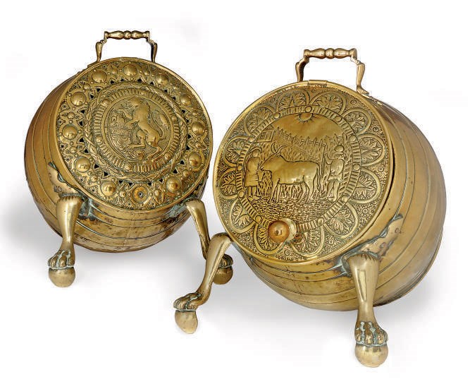 A PAIR OF EMBOSSED BRASS COAL SCUTTLES