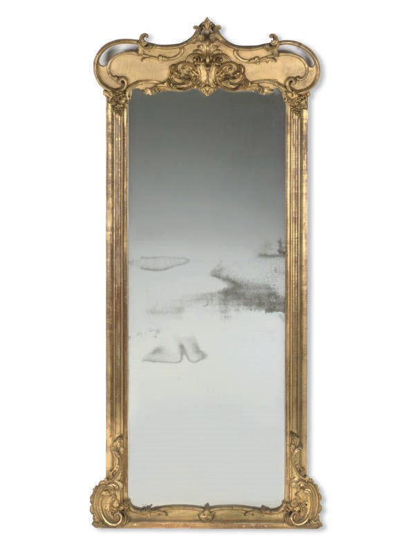 A FRENCH GILT COMPOSITION PIER-MIRROR