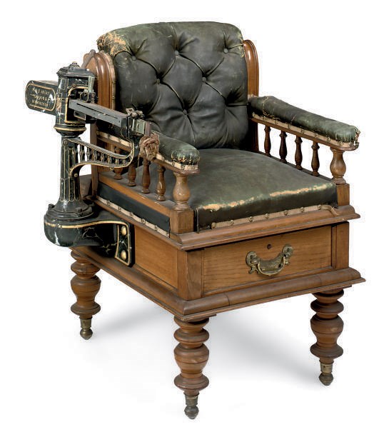 A SET OF LATE VICTORIAN OAK AND CAST-IRON JOCKEY SCALES