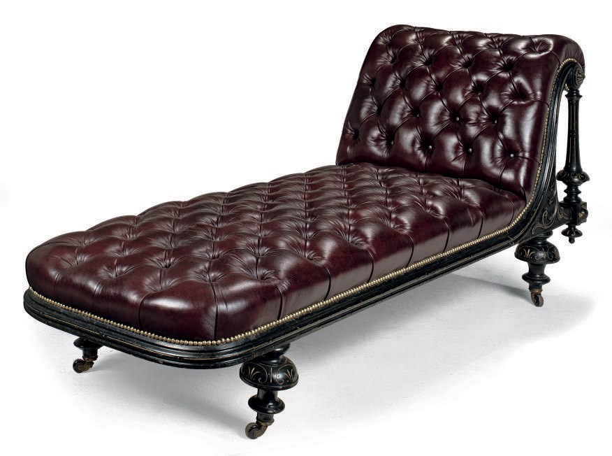 A VICTORIAN EBONISED PARCEL-GILT DECORATED CHAISE LONGUE
