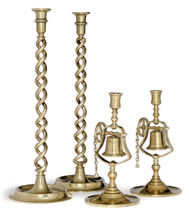 A PAIR OF BRASS 'TAVERN' CANDLESTICKS