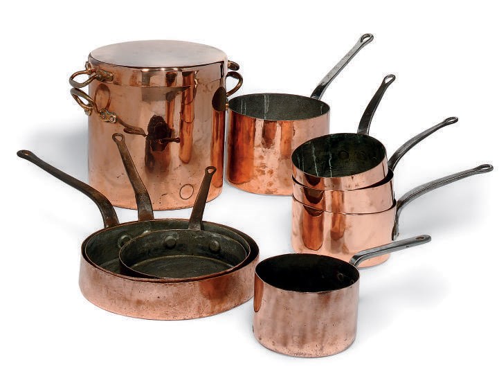 A MATCHED SET OF EIGHT SIMILAR VICTORIAN COPPER SAUCEPANS