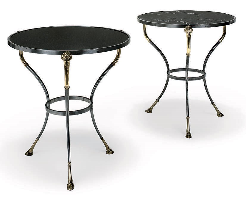 A NEAR PAIR OF STEEL AND BRASS GUERIDONS