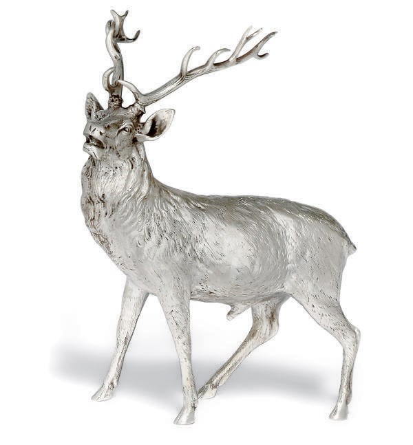 A CONTINENTAL METALWARE TABLE ORNAMENT IN THE FORM OF A STAG
