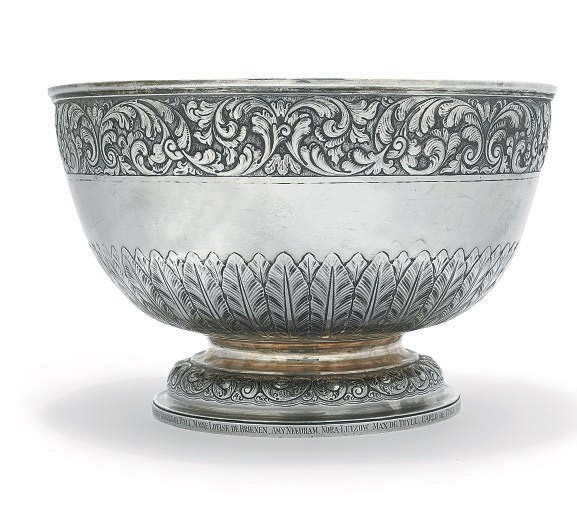A SILVER PUNCH BOWL CHASED IN THE INDIAN MANNER