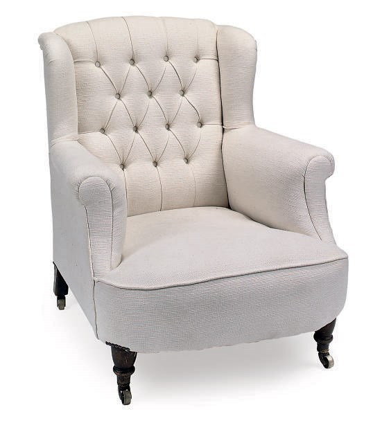 A LATE VICTORIAN WALNUT WING-ARMCHAIR