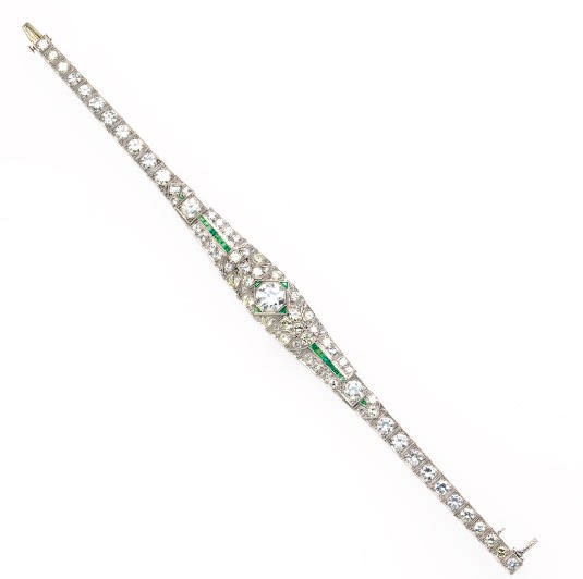 AN ART DECO EMERALD AND DIAMOND BRACELET