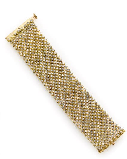 A DIAMOND AND GOLD BRACELET
