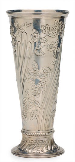 AN AMERICAN SILVER TRUMPET VASE REPOUSSE WITH FLOWERS,