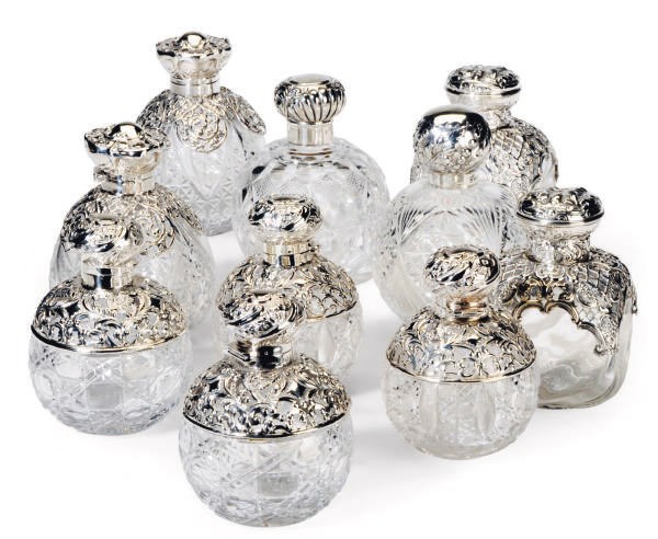 EIGHT PAIRS OF ENGLISH SILVER-MOUNTED GLASS SCENT BOTTLES,