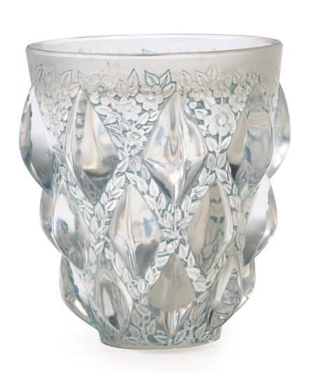A FRENCH MOLDED AND PATINATED GLASS VASE,