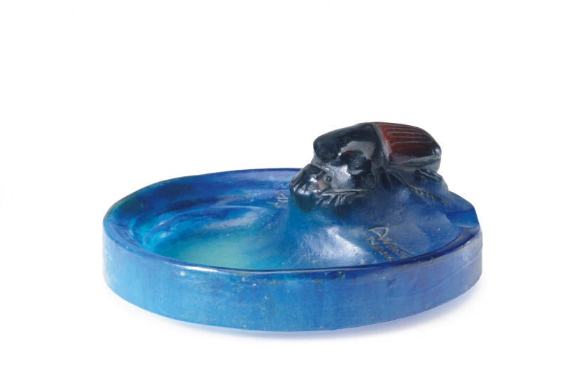 A FRENCH PATE-DE-VERRE VIDE POCHE MOLDED WITH A SCARAB,
