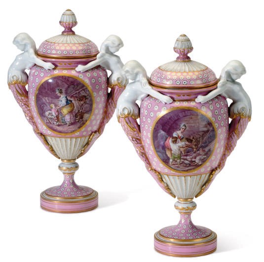 A PAIR OF SEVRES STYLE PINK-GROUND VASES AND COVERS,