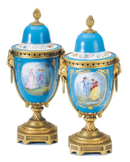 A PAIR OF GILT-METAL MOUNTED SEVRES STYLE TURQUOISE-GROUND VASES AND COVERS,