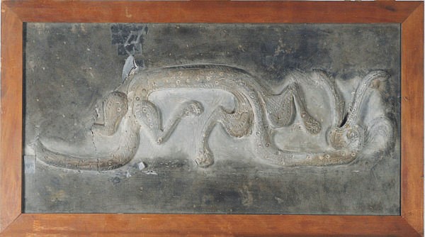 A LARGE CHINESE GREY POTTERY TILE MOLDED WITH A DRAGON,