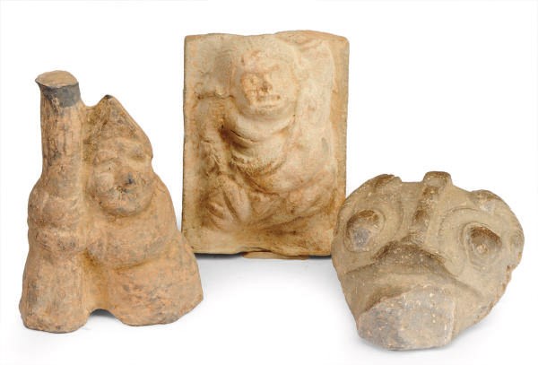 A CHINESE POTTERY FIGURAL SUPPORT AND A PLAQUE MOLDED WITH A FOREIGNER,