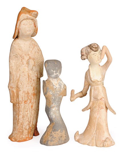 A PAINTED RED POTTERY FIGURE OF A FAT LADY,