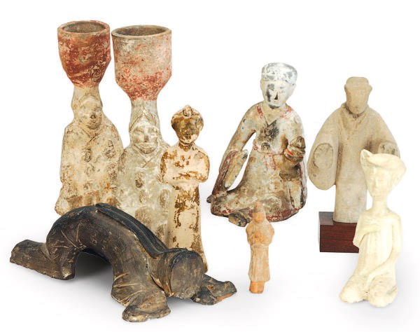 A PAIR OF CHINESE POTTERY FIGURAL CANDLEHOLDERS AND FIVE FIGURES,