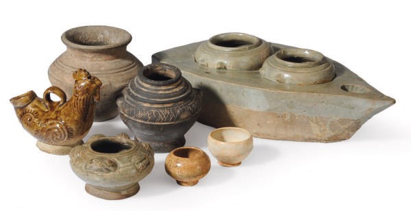 A CHINESE CELADON-GLAZED MODEL OF A BOAT STOVE AND A GROUP OF POTTERY VESSELS,
