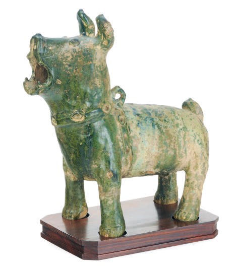 A CHINESE GREEN-GLAZED MODEL OF A DOG,