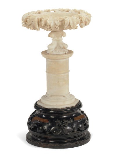 AN ALABASTER BIRD BATH,