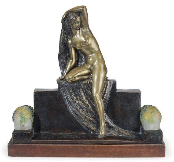 A FRENCH BRONZE AND COLORED GLASS FIGURAL TABLE LAMP,