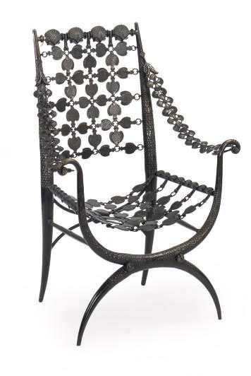 A PATIANTED BRONZE ARMCHAIR,