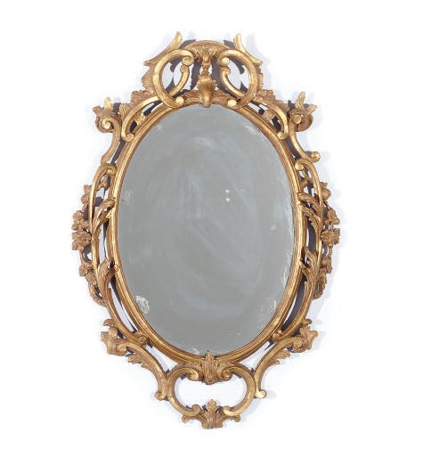 A CONTINENTAL GILTWOOD MIRROR,