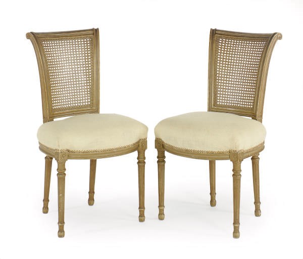 A SET OF SIX CREAM-PAINTED AND CANED SIDE CHAIRS,