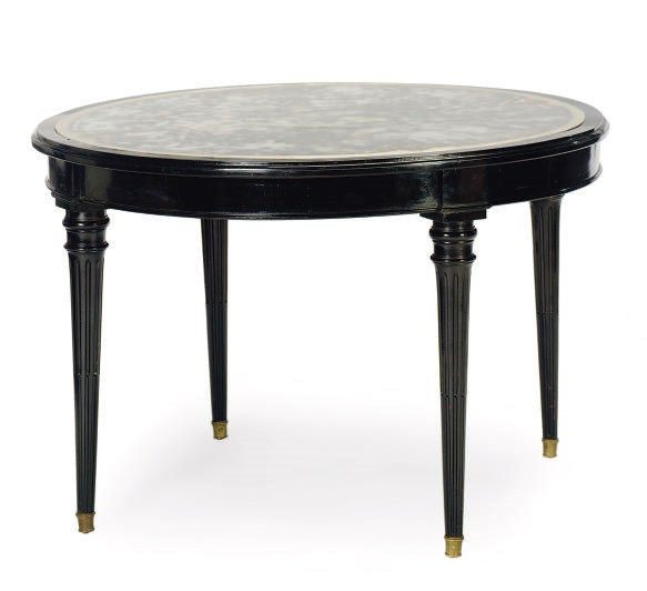 AN EBONIZED AND INSET MIRRORED CENTER TABLE,